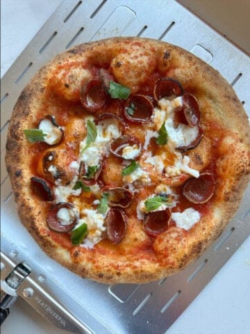 top view of hot honey pepperoni neapolitan pizza from Ooni.
