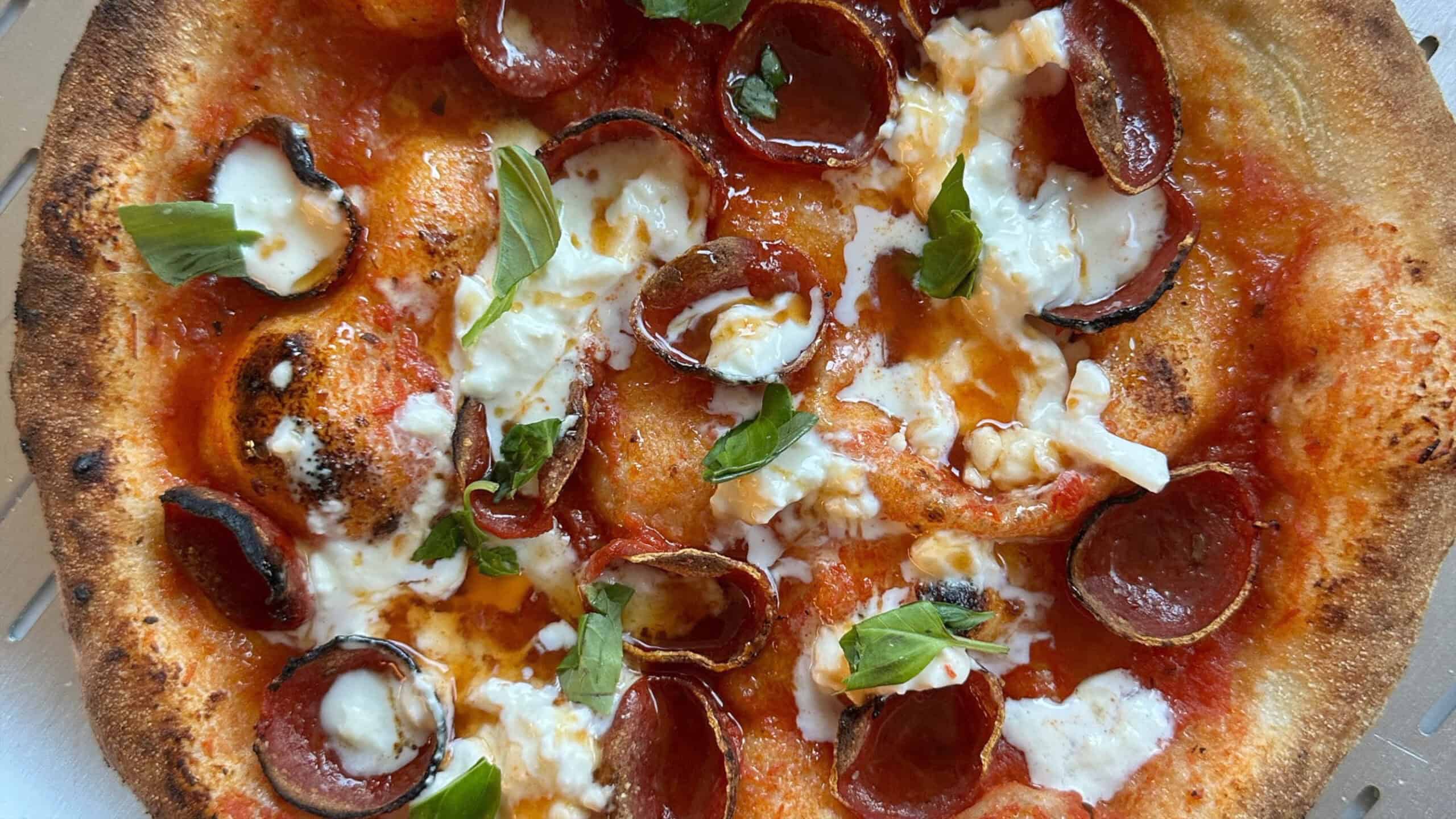 Close view of pizza toppings. 