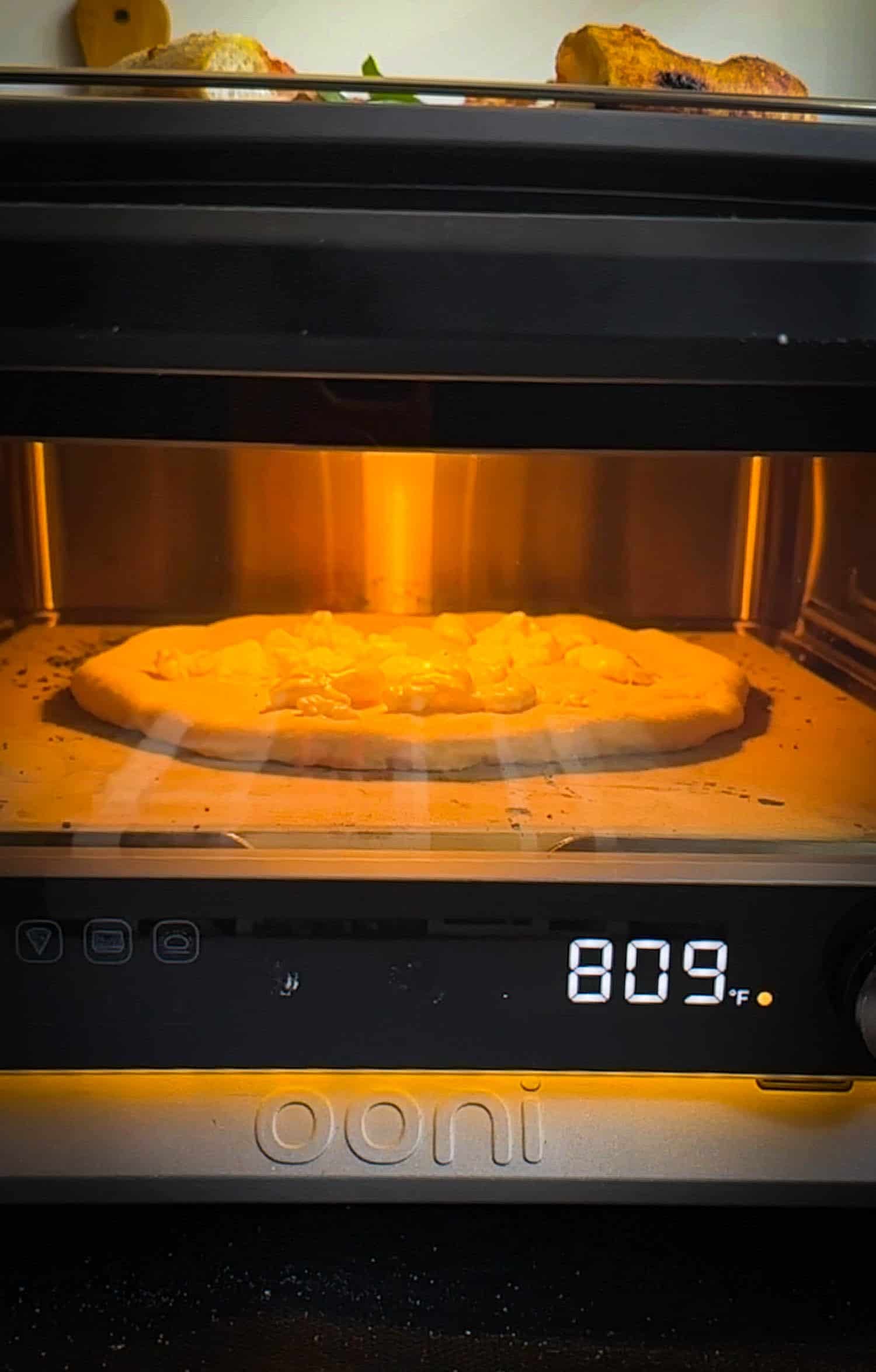 Photo of white pie in Ooni volt 2. 