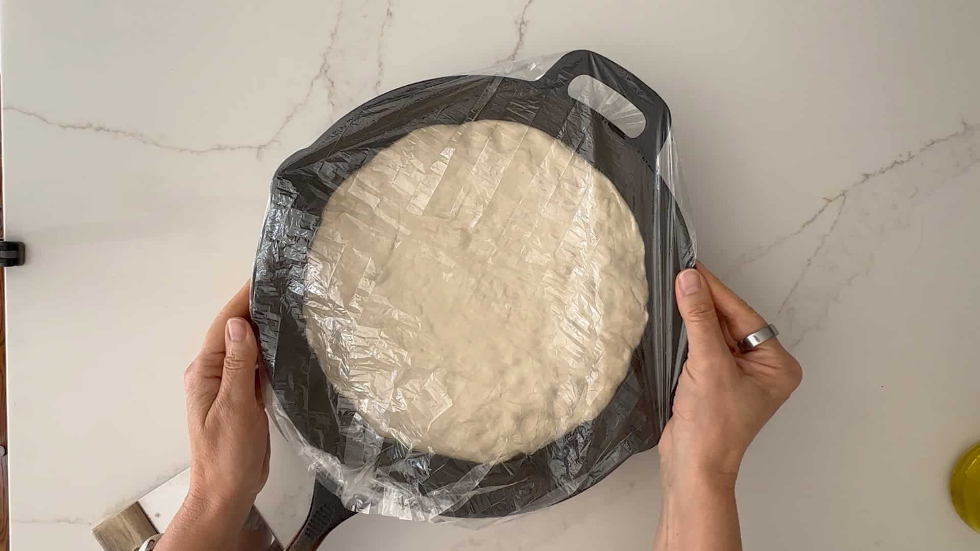 dough in pan, covered and read to rise. 