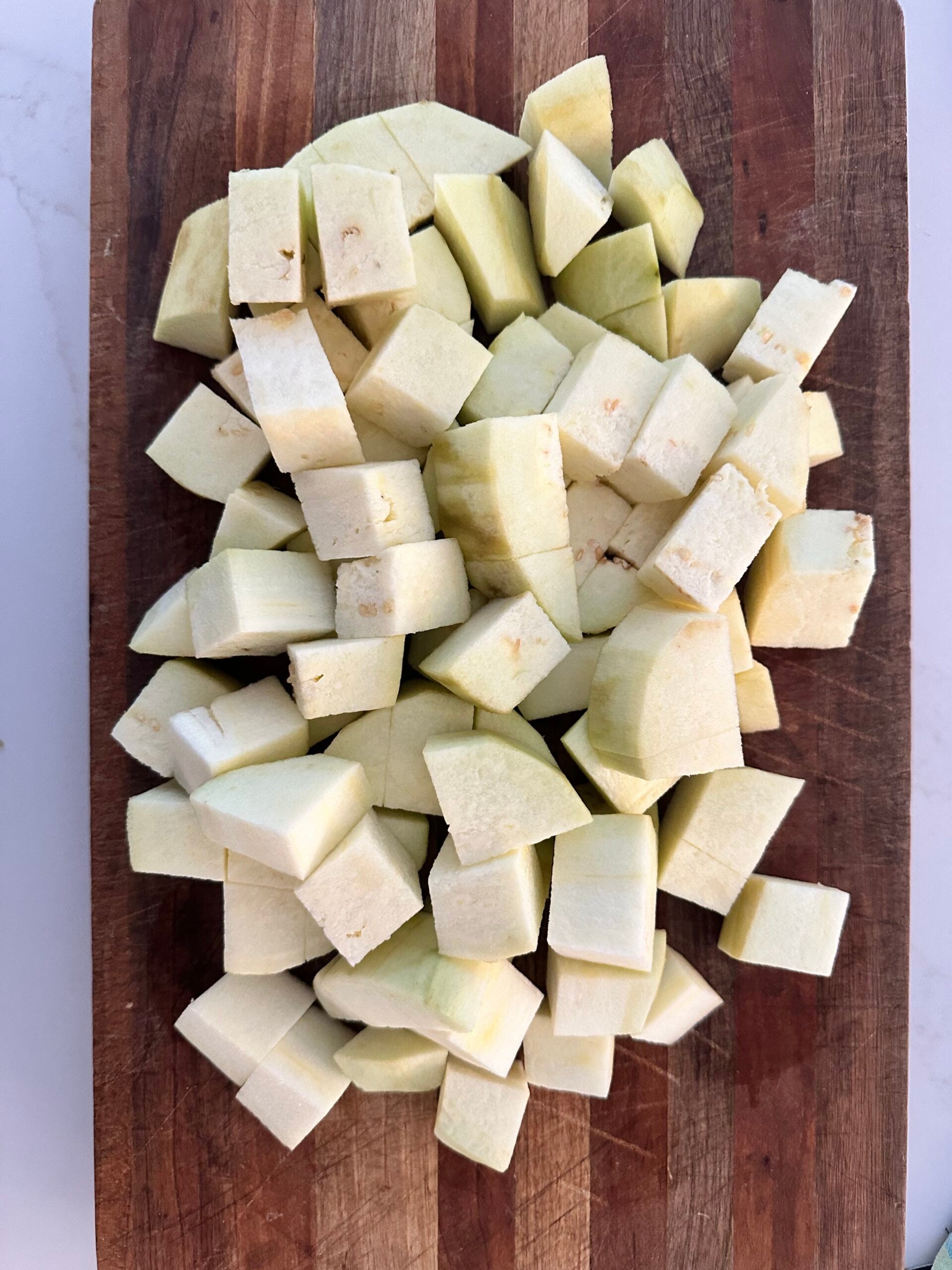 Peeled and cubed eggplant.